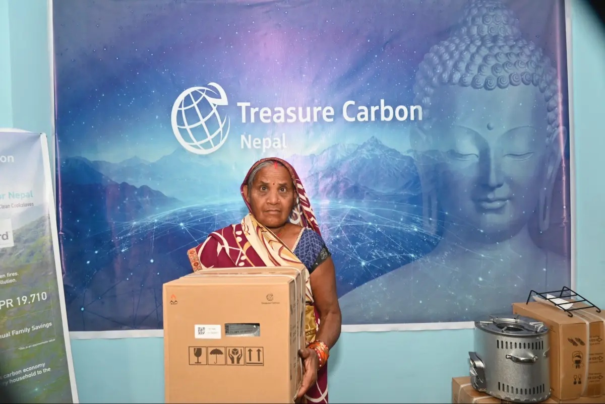 Programme participant with an improved cookstove